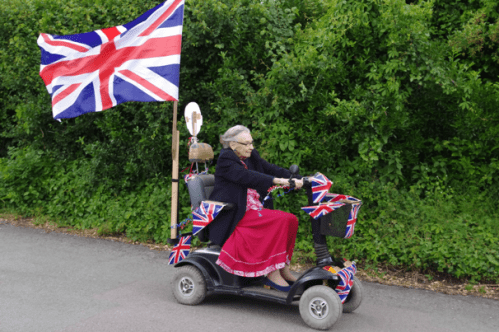 Look at this Granny FLY! Her ride shows the world who she is - proudly British, full of fun, and someone NOT afraid to take corners on two wheels! As her grandchildren remember her "A legend who lived life to the full - advocate of a 'no BS' approach to people"